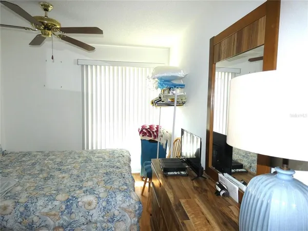 a view of living room with furniture and a flat screen tv