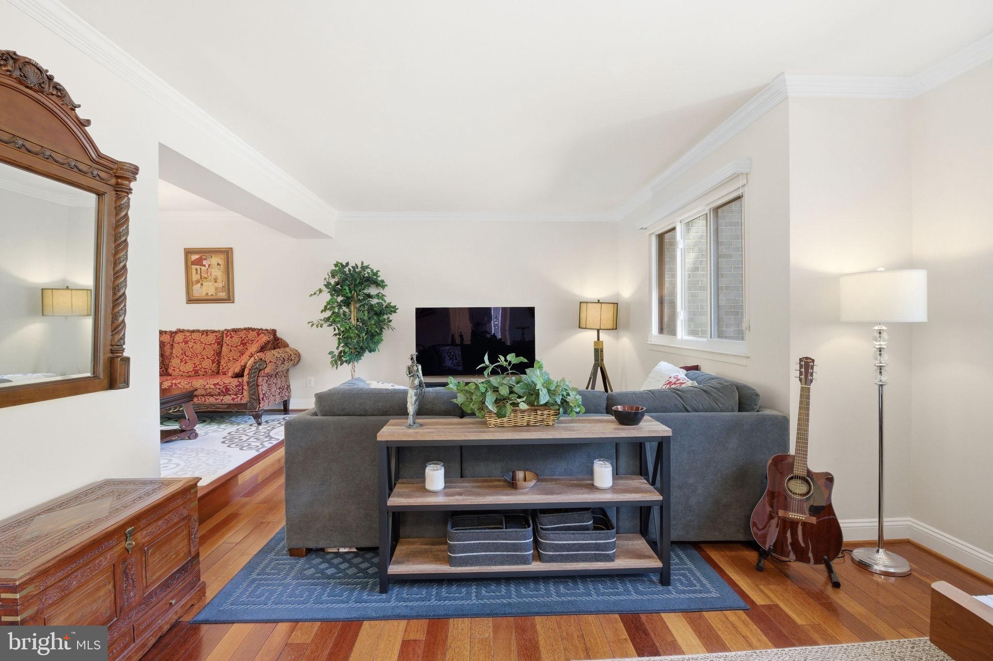1509 Farsta Court Reston, VA 20190 - Photo 13 of 40 a living room with furniture and a flat screen tv
