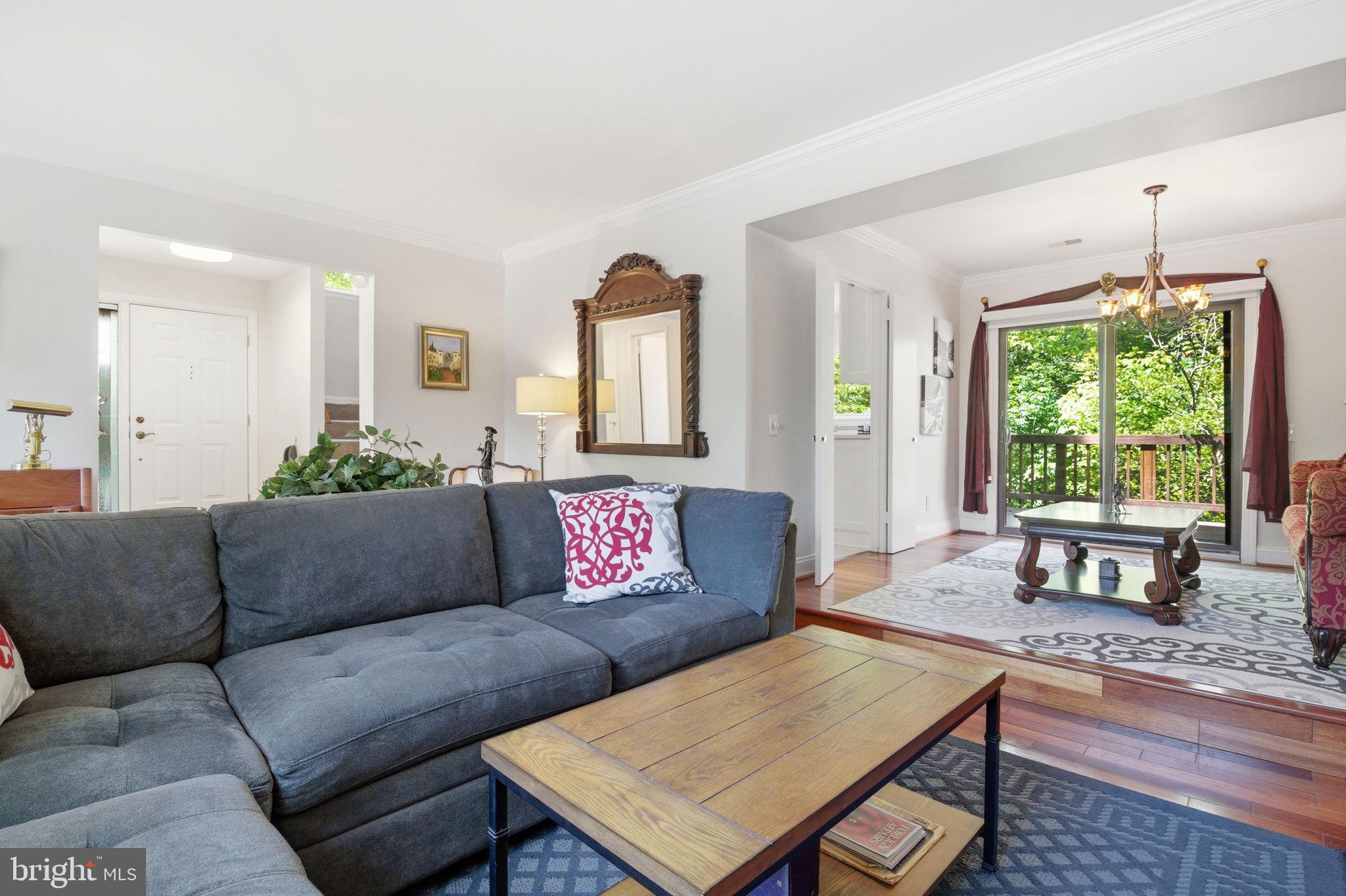 1509 Farsta Court Reston, VA 20190 - Photo 15 of 40 a living room with furniture and a large window