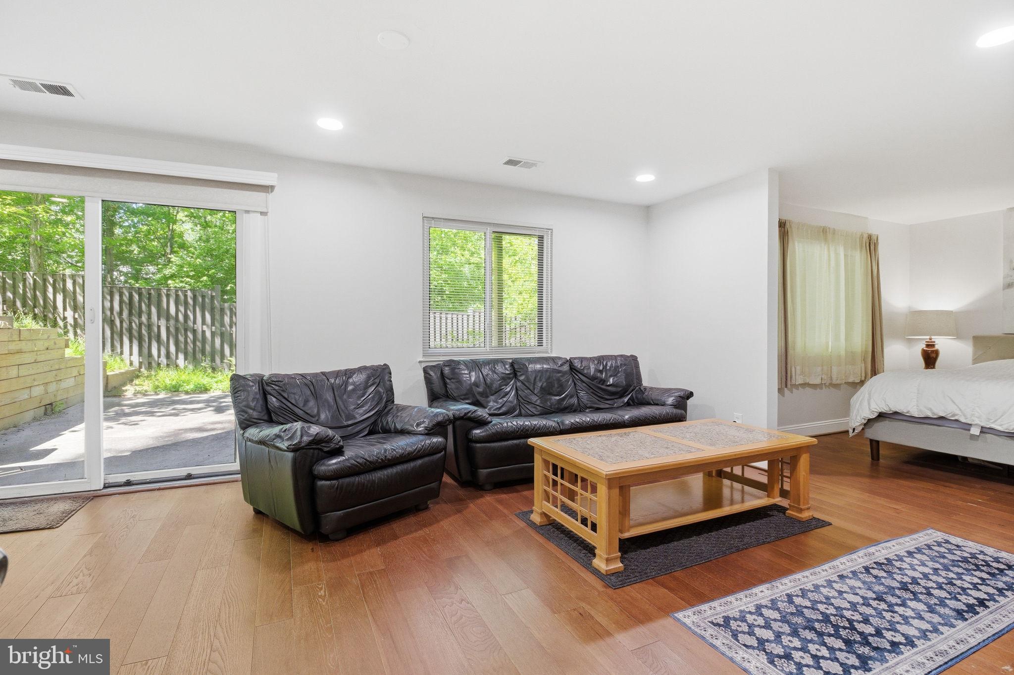 1509 Farsta Court Reston, VA 20190 - Photo 24 of 40 a living room with furniture and a couch