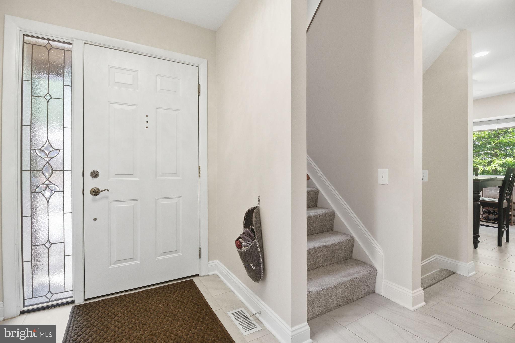 1509 Farsta Court Reston, VA 20190 - Photo 3 of 40 a view of an entryway with staircase