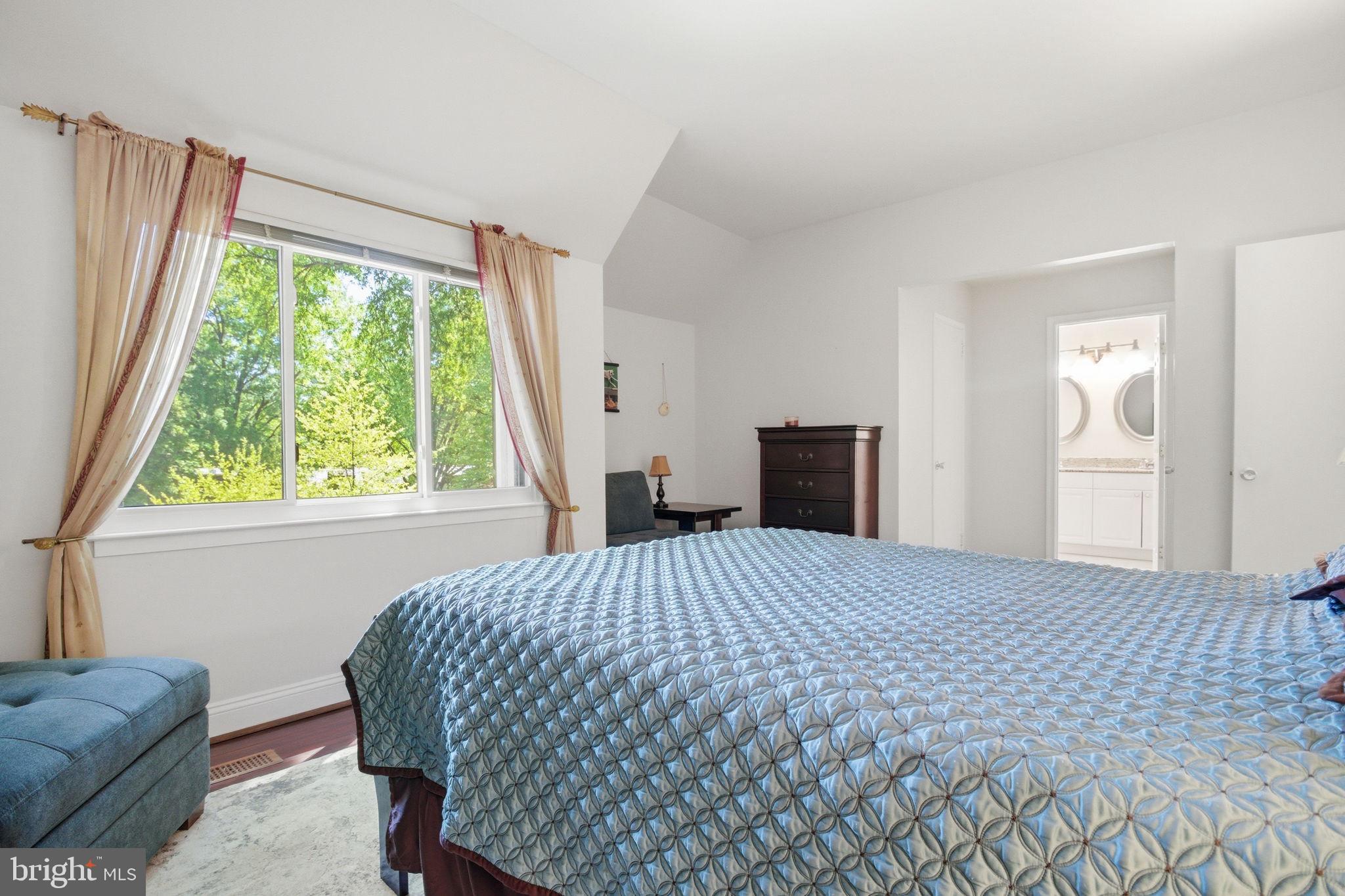 1509 Farsta Court Reston, VA 20190 - Photo 31 of 40 a bedroom with a bed and a couch