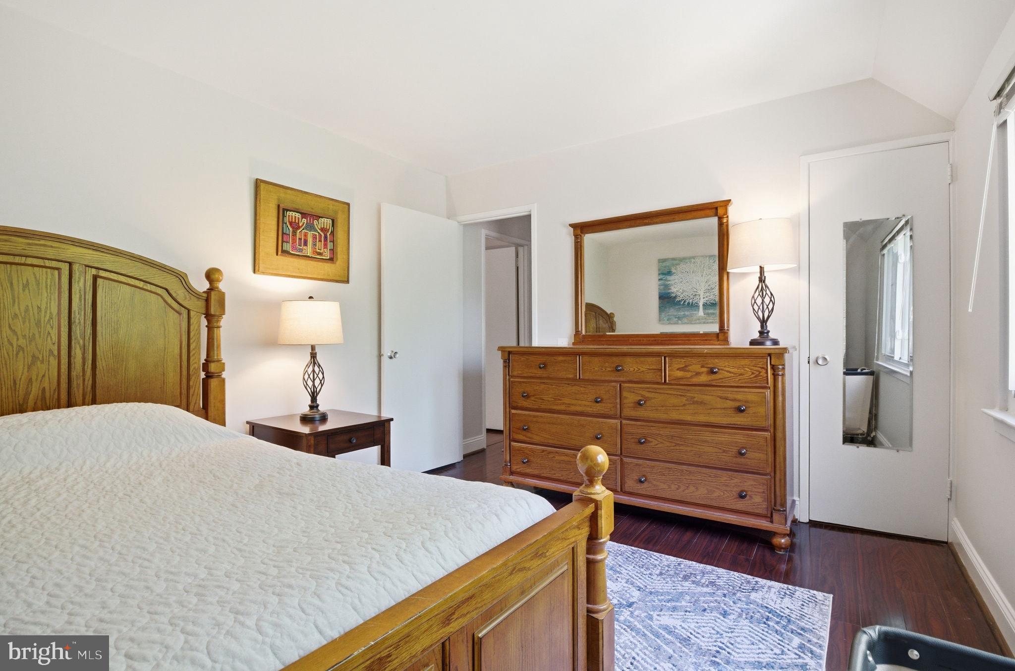 1509 Farsta Court Reston, VA 20190 - Photo 32 of 40 a bedroom with a bed and a dresser