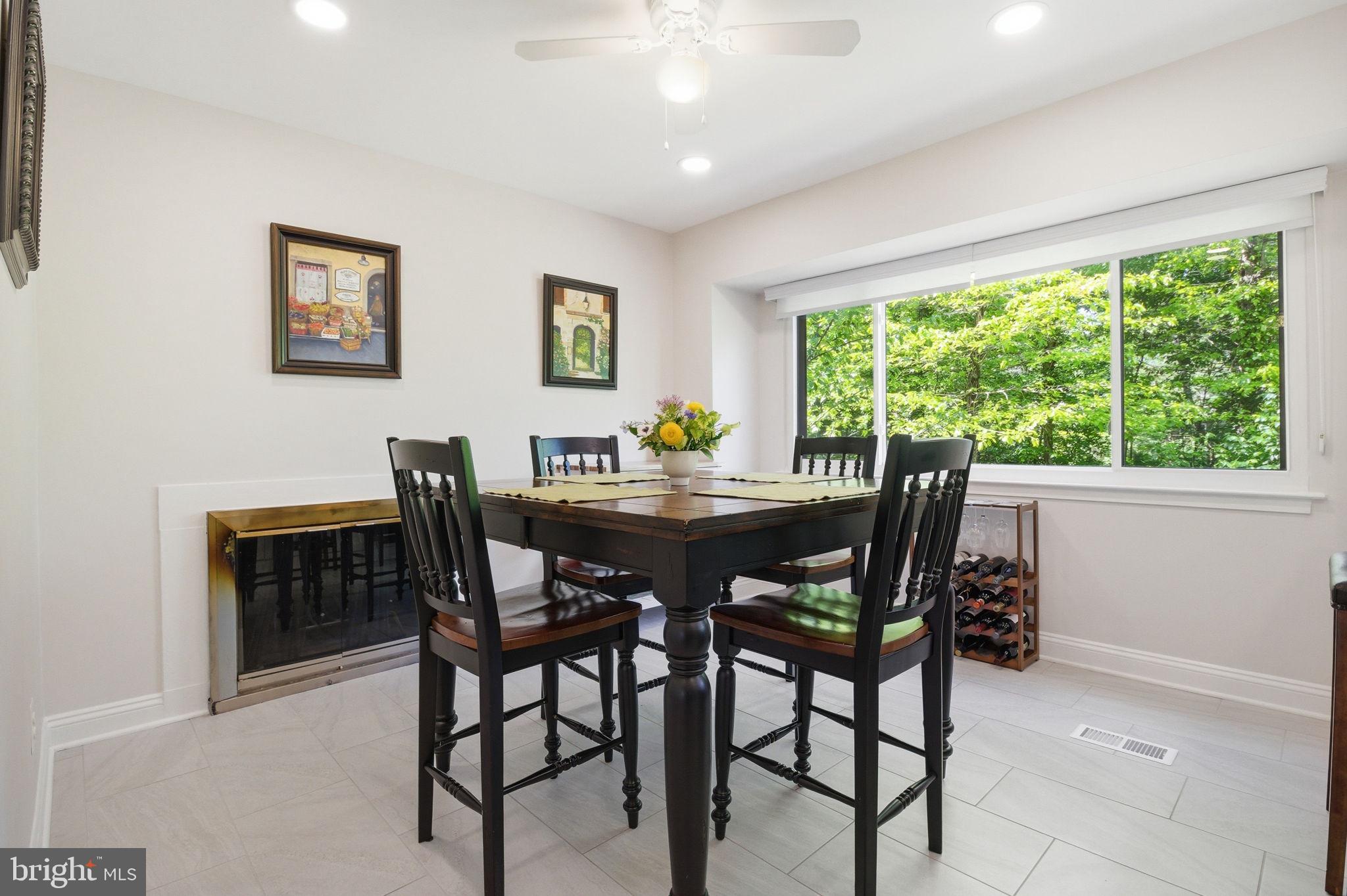 1509 Farsta Court Reston, VA 20190 - Photo 10 of 40 a view of a dining room with furniture window and outside view