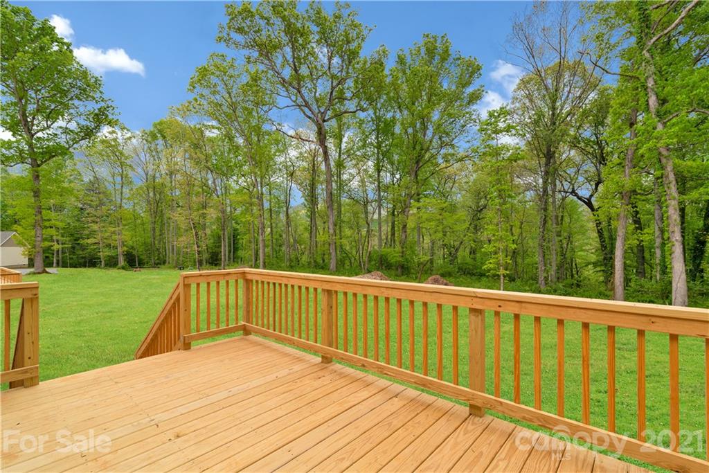 296 Ridge View Drive, Unit 7 Clyde, NC 28721 - Photo 13 of 19 a view of a backyard