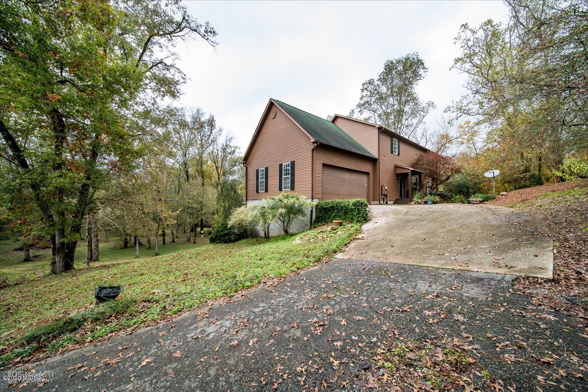 146 Old Graham Road Gray, GA 31032 - Photo 1 of 33 a house with a yard