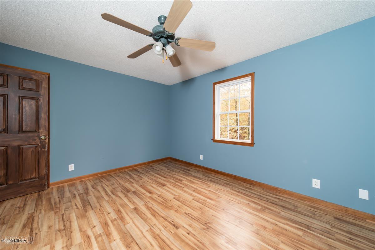 146 Old Graham Road Gray, GA 31032 - Photo 14 of 33 a view of an empty room with a window