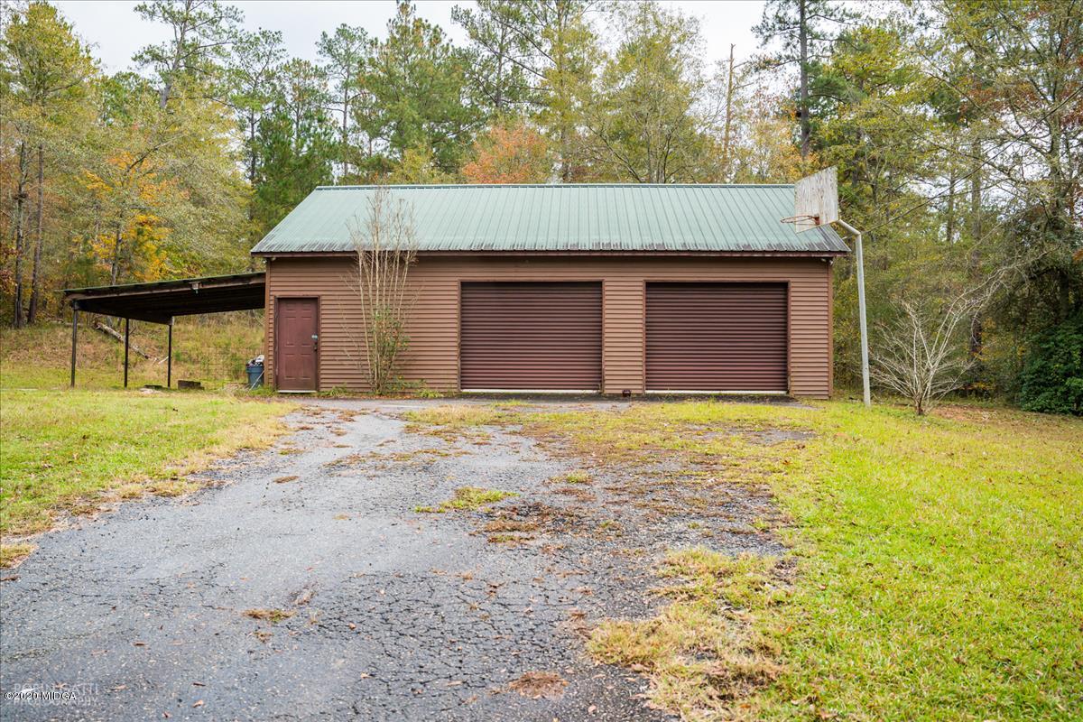 146 Old Graham Road Gray, GA 31032 - Photo 23 of 33 a front view of a house with a yard