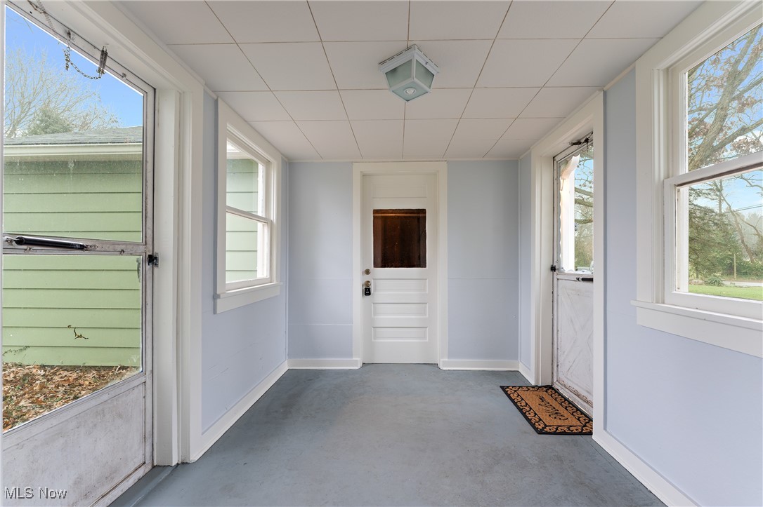 631 Killinger Road Clinton, OH 44216 - Photo 28 of 50 Unfurnished sunroom with a healthy amount of sunlight