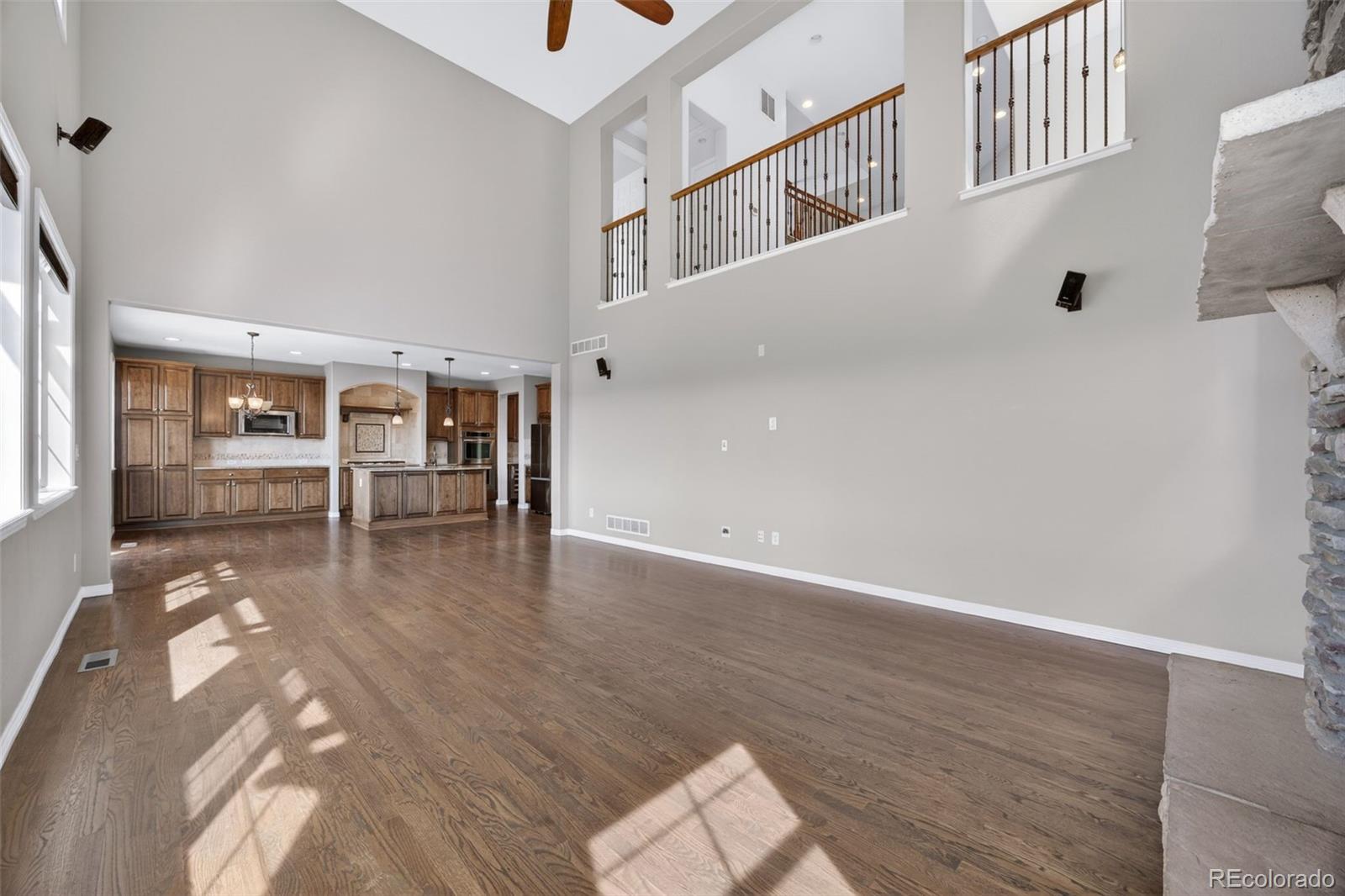 10872 Valleybrook Circle Highlands Ranch, CO 80130 - Photo 20 of 50 a view of an entryway with wooden floor