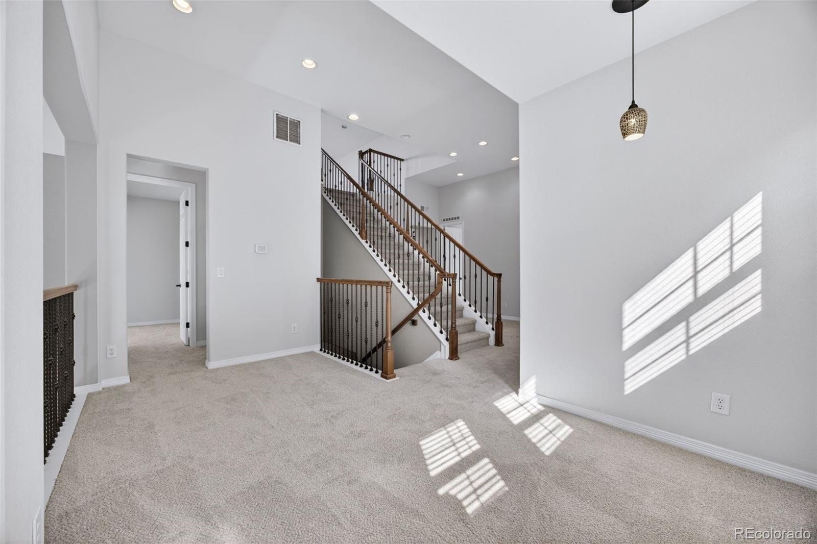10872 Valleybrook Circle Highlands Ranch, CO 80130 - Photo 24 of 50 a view of entryway and hall with a window