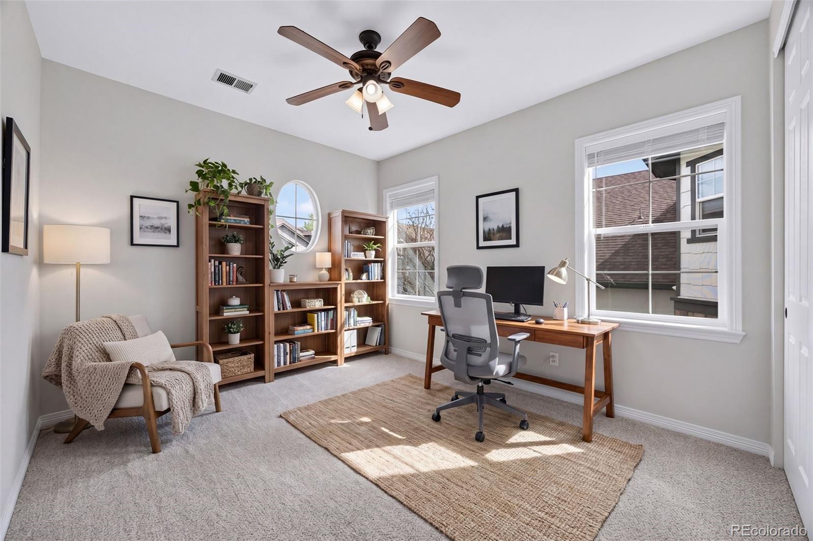10872 Valleybrook Circle Highlands Ranch, CO 80130 - Photo 27 of 50 a workspace with furniture