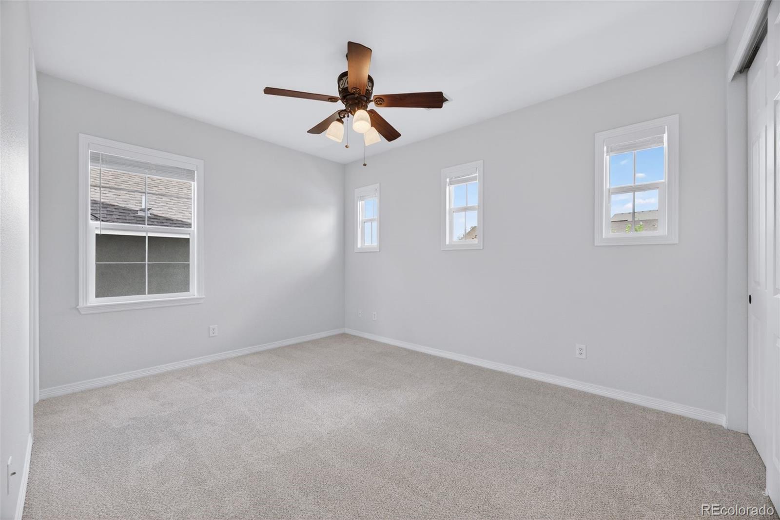 10872 Valleybrook Circle Highlands Ranch, CO 80130 - Photo 30 of 50 a view of empty room with windows
