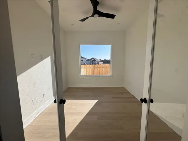 a view of an empty room and window