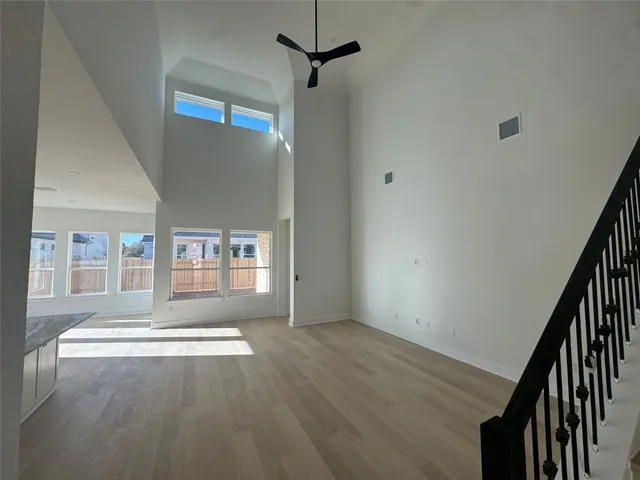 a view of livingroom with window and hardwood floor