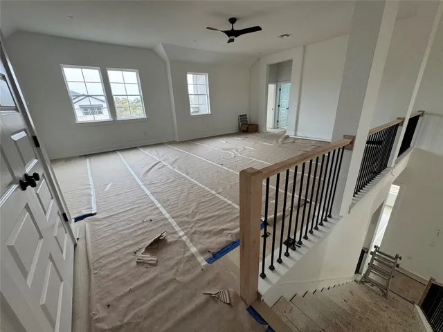 a view of a livingroom with a staircase