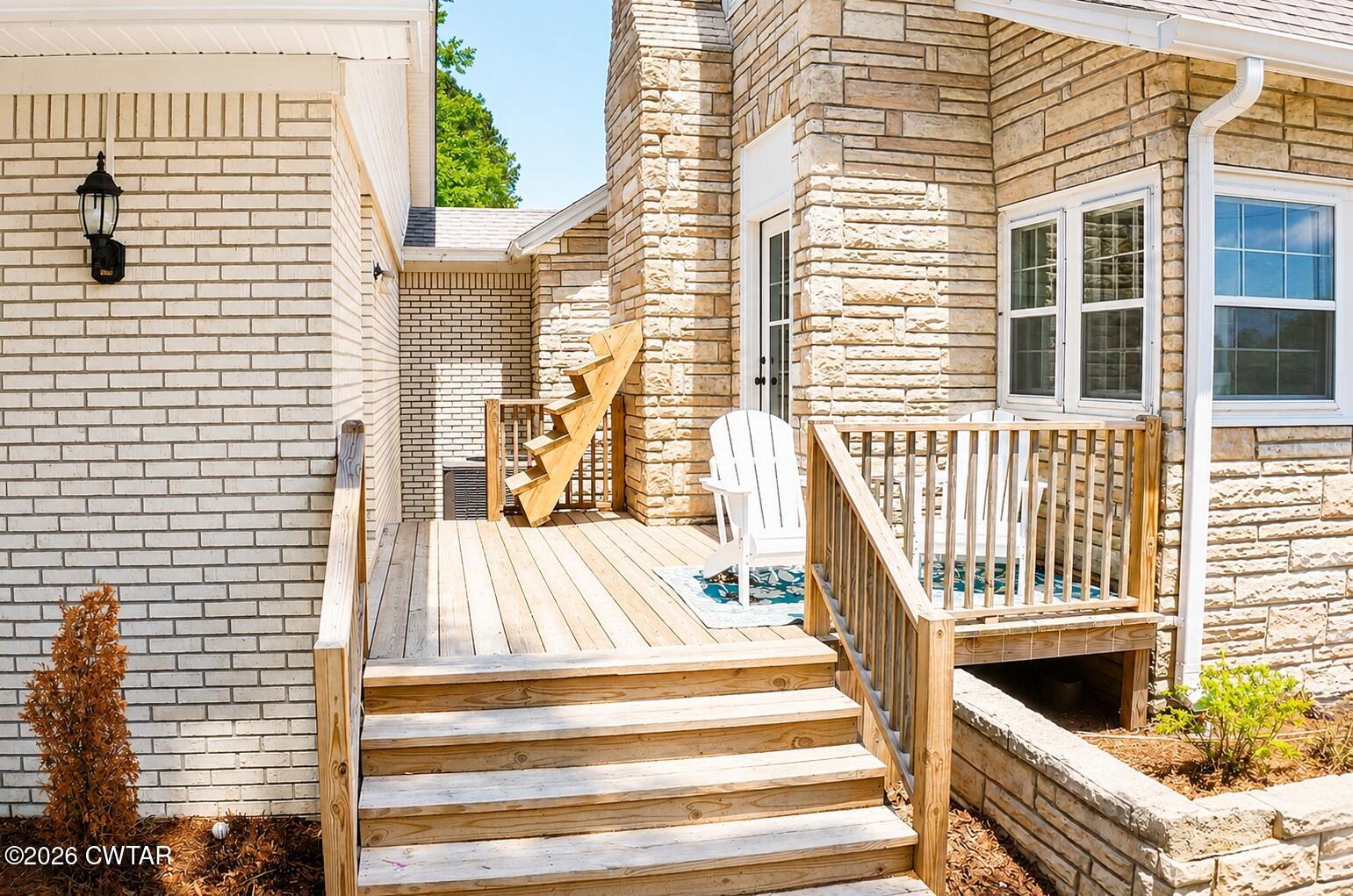 2800 Locust Grove Road Newbern, TN 38059 - Photo 3 of 46 a view of a balcony with a floor to ceiling window