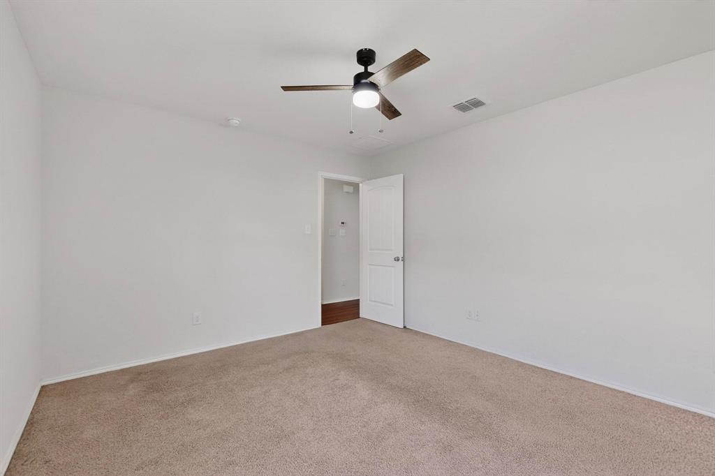 5516 McClelland Street Forney, TX 75126 - Photo 19 of 36 Unfurnished room featuring carpet and a ceiling fan