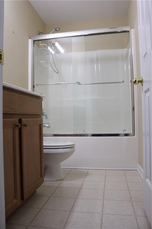 607 Hidden Close Woodstock, GA 30188 - Photo 6 of 11 a bathroom with a bathtub and a shower