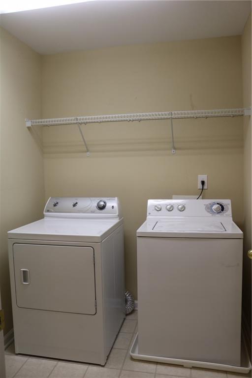 607 Hidden Close Woodstock, GA 30188 - Photo 8 of 11 a utility room with dryer and washer