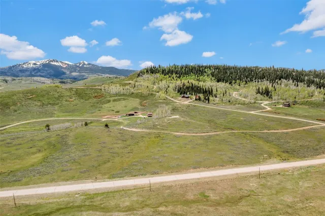 a view of an ocean and a mountain