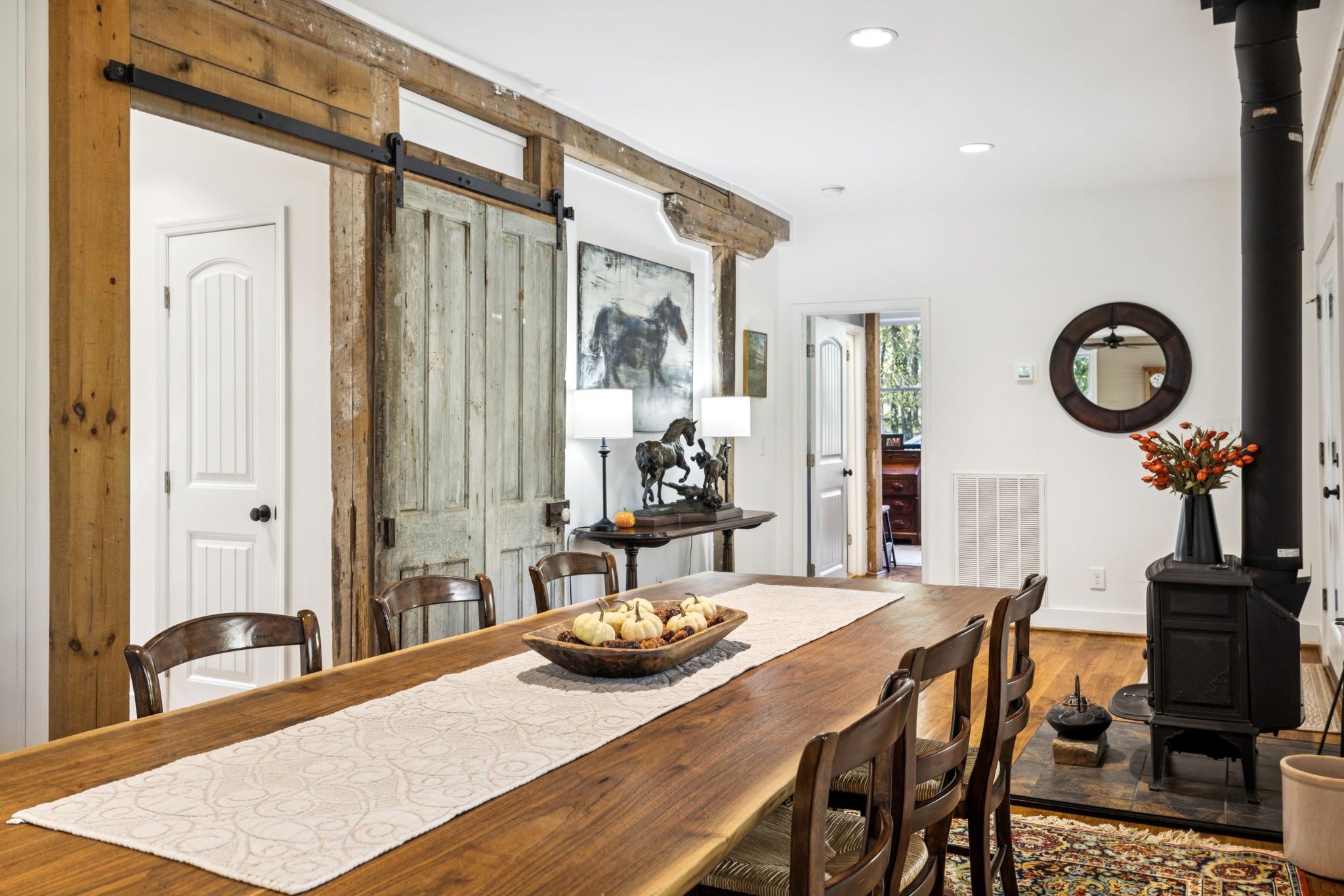2064 Old Hillsboro Road Franklin, TN 37064 - Photo 12 of 57 a dining room with furniture and a mirror