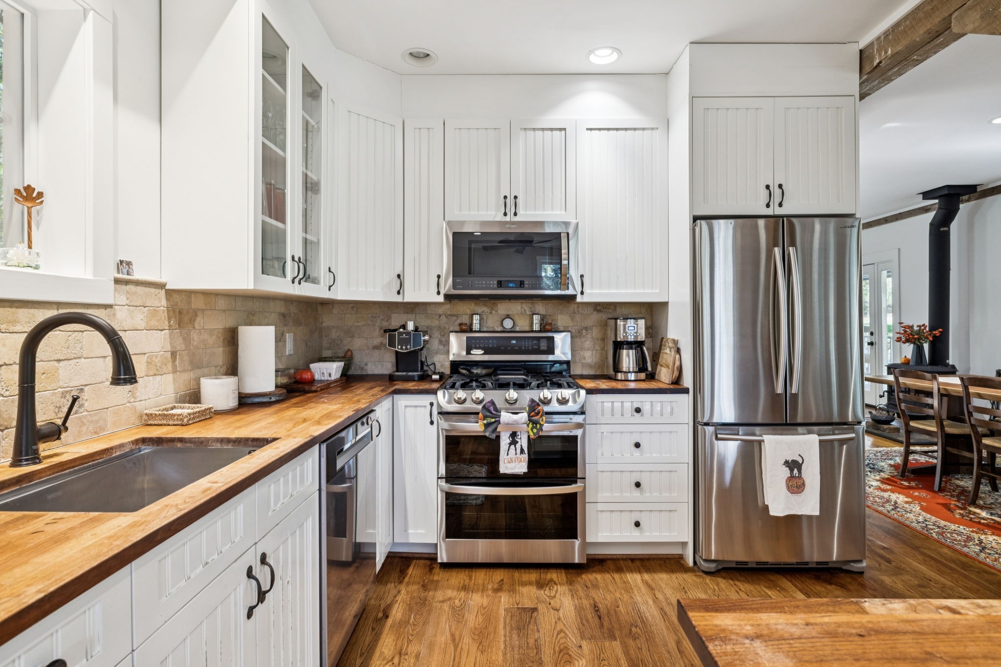2064 Old Hillsboro Road Franklin, TN 37064 - Photo 22 of 57 a kitchen with a refrigerator stove and sink