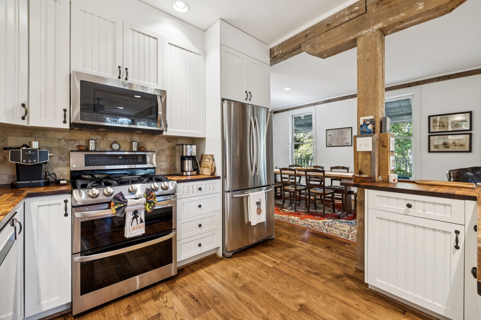 2064 Old Hillsboro Road Franklin, TN 37064 - Photo 23 of 57 a kitchen with stainless steel appliances a stove a sink and a refrigerator