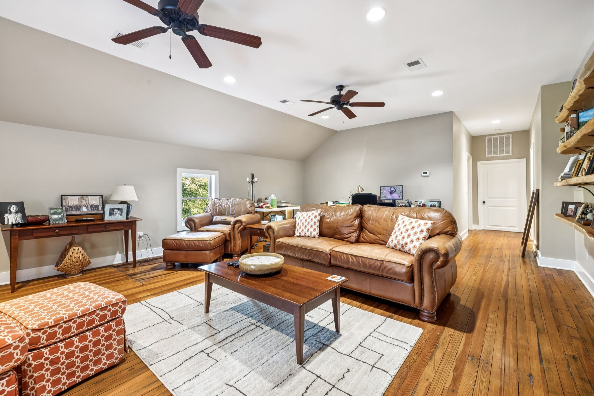 2064 Old Hillsboro Road Franklin, TN 37064 - Photo 41 of 57 a living room with furniture and a wooden floor
