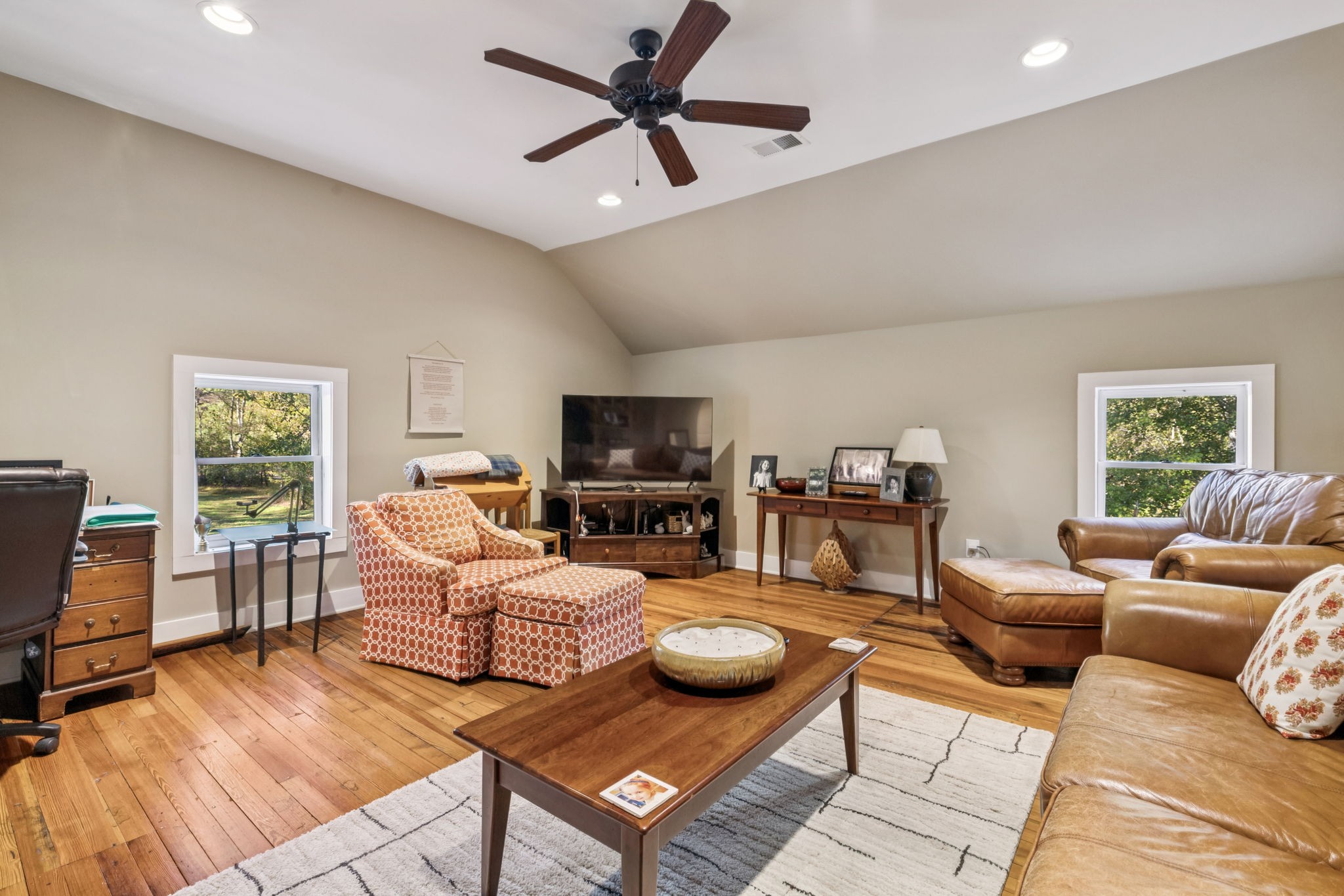 2064 Old Hillsboro Road Franklin, TN 37064 - Photo 44 of 57 a living room with furniture ceiling fan and a window