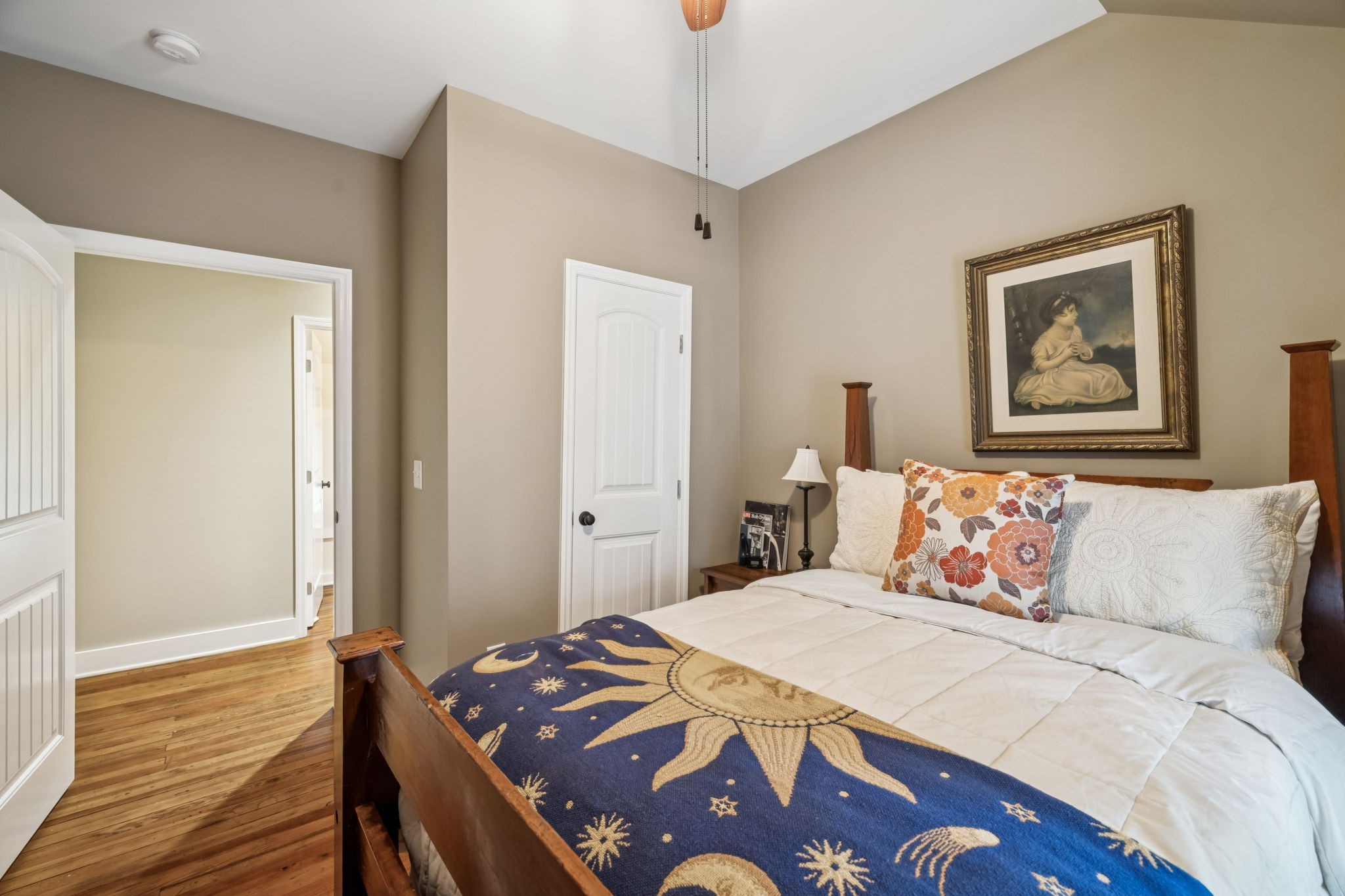 2064 Old Hillsboro Road Franklin, TN 37064 - Photo 46 of 57 a bedroom with a bed and wooden floor