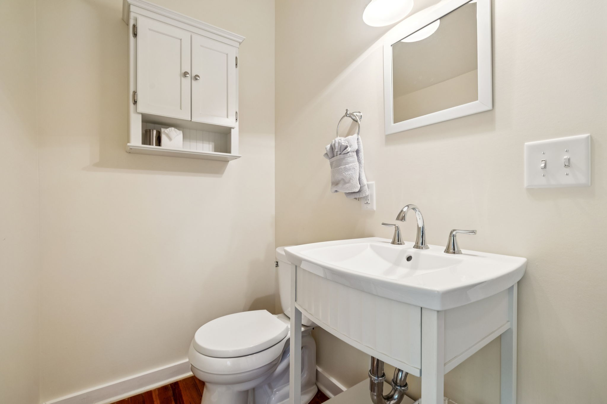 2064 Old Hillsboro Road Franklin, TN 37064 - Photo 47 of 57 a white toilet sitting next to a bathroom sink
