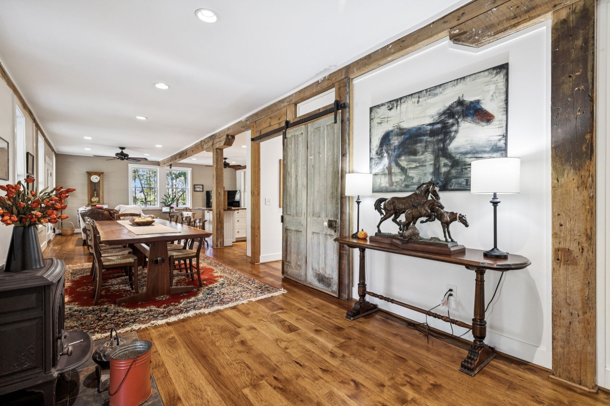 2064 Old Hillsboro Road Franklin, TN 37064 - Photo 6 of 57 a living room with furniture a rug and a painting on the wall