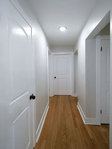 a view of a livingroom with wooden floor