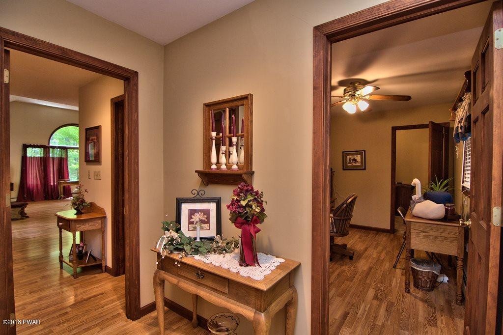 1 East Lake Road Moscow, PA 18444 - Photo 13 of 88 a view of a workspace with furniture and wooden floor