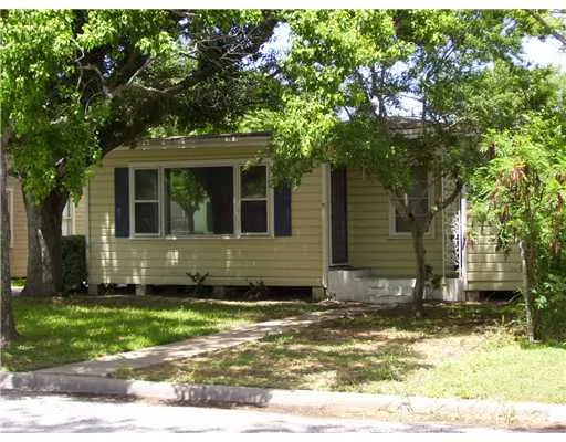 a view of house with yard
