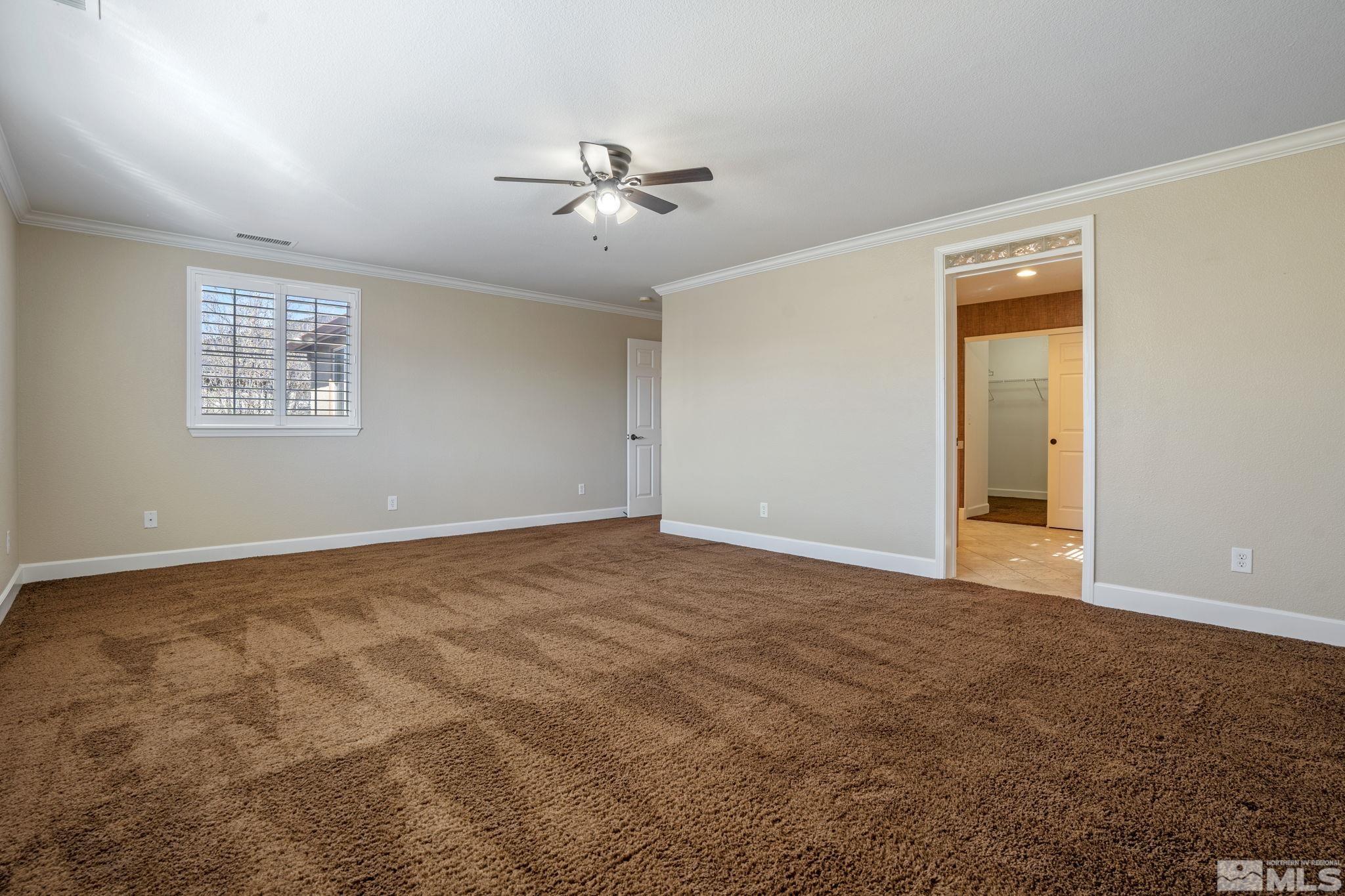 1980 Angel Ridge Drive Reno, NV 89521 - Photo 21 of 39 a view of an empty room with a window