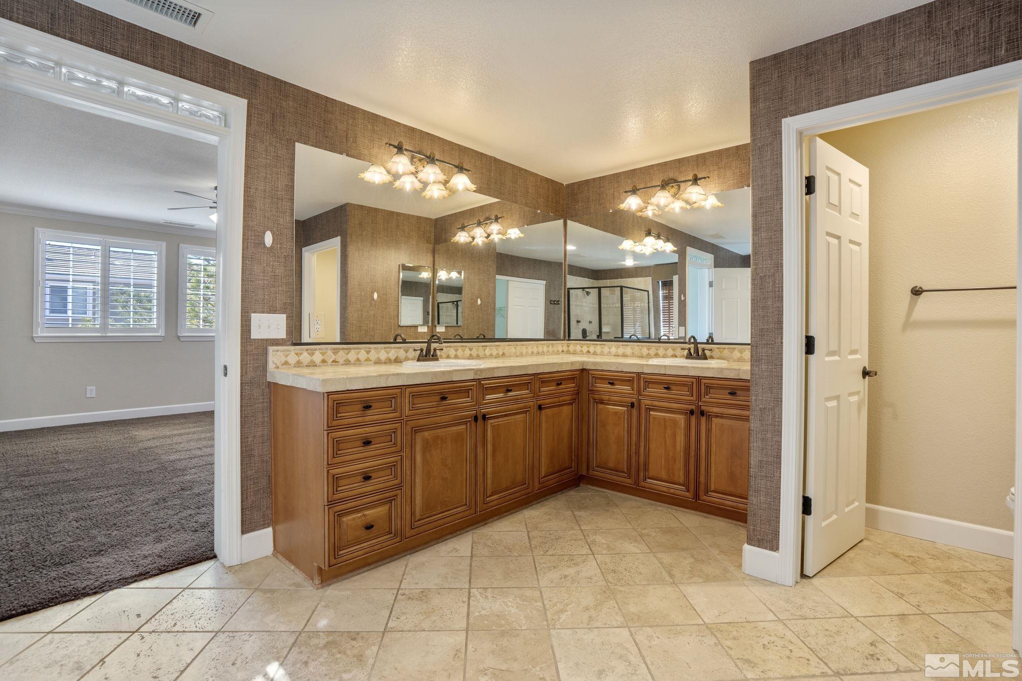 1980 Angel Ridge Drive Reno, NV 89521 - Photo 24 of 39 a kitchen with a sink and cabinets