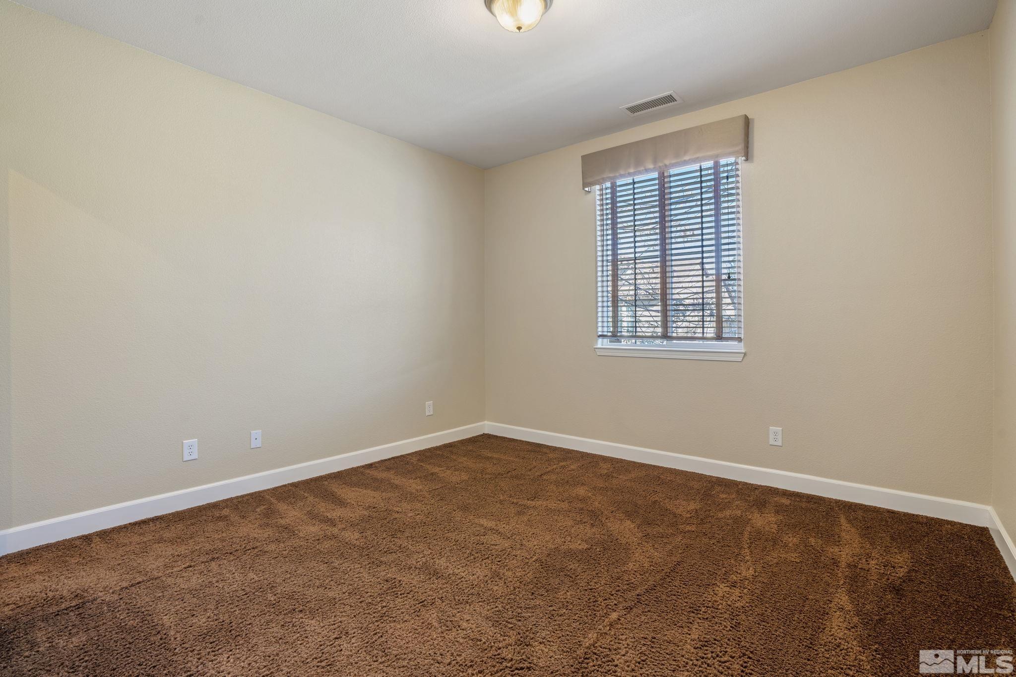 1980 Angel Ridge Drive Reno, NV 89521 - Photo 33 of 39 an empty room with windows