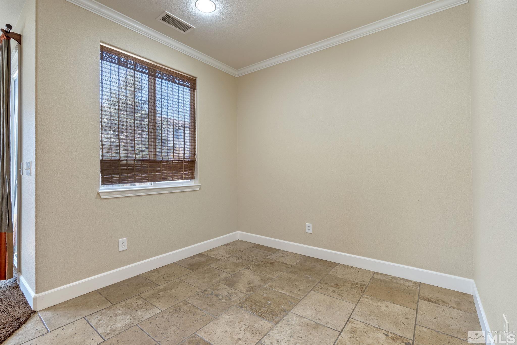 1980 Angel Ridge Drive Reno, NV 89521 - Photo 34 of 39 a view of an empty room with a window