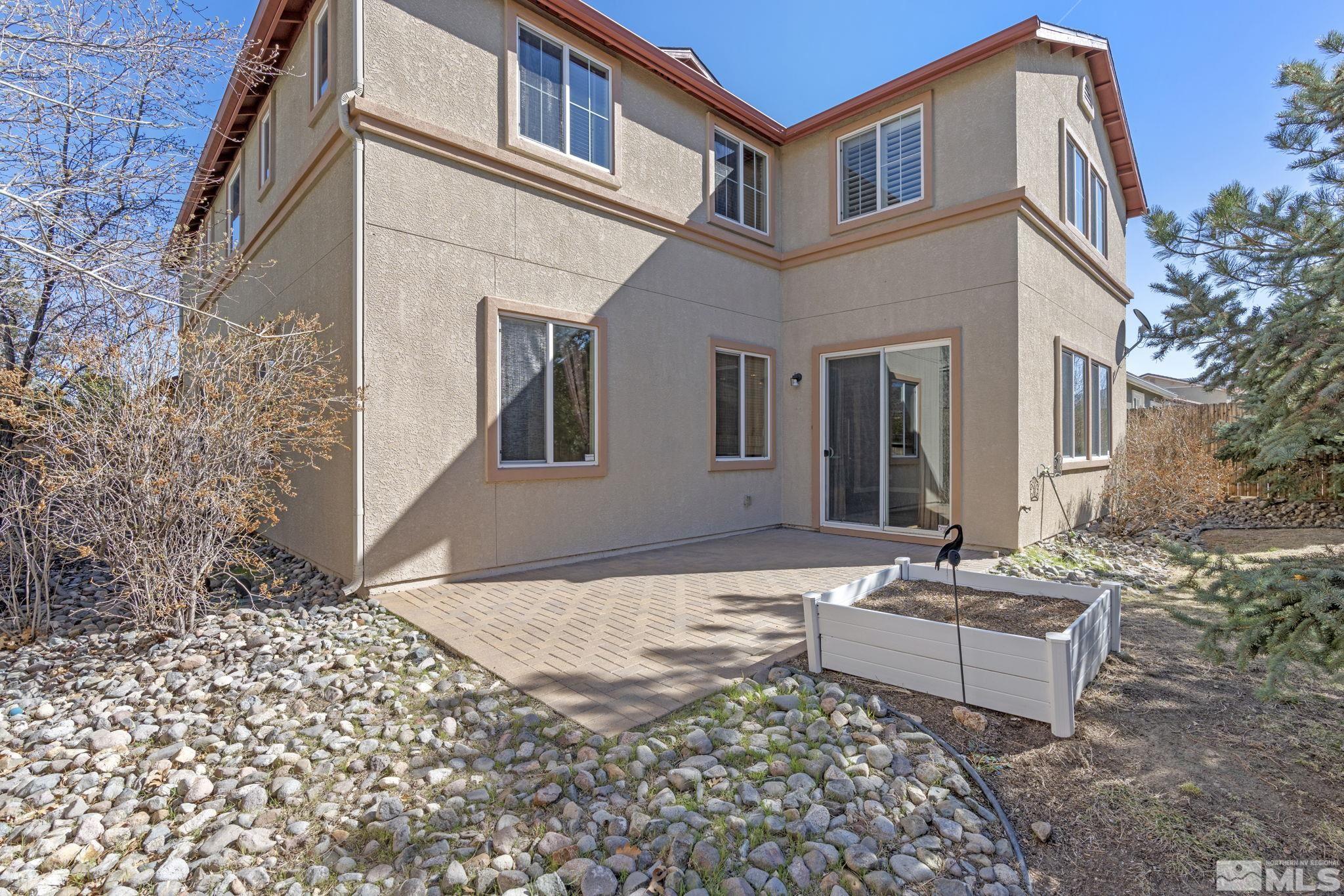 1980 Angel Ridge Drive Reno, NV 89521 - Photo 37 of 39 a front view of a house with a yard