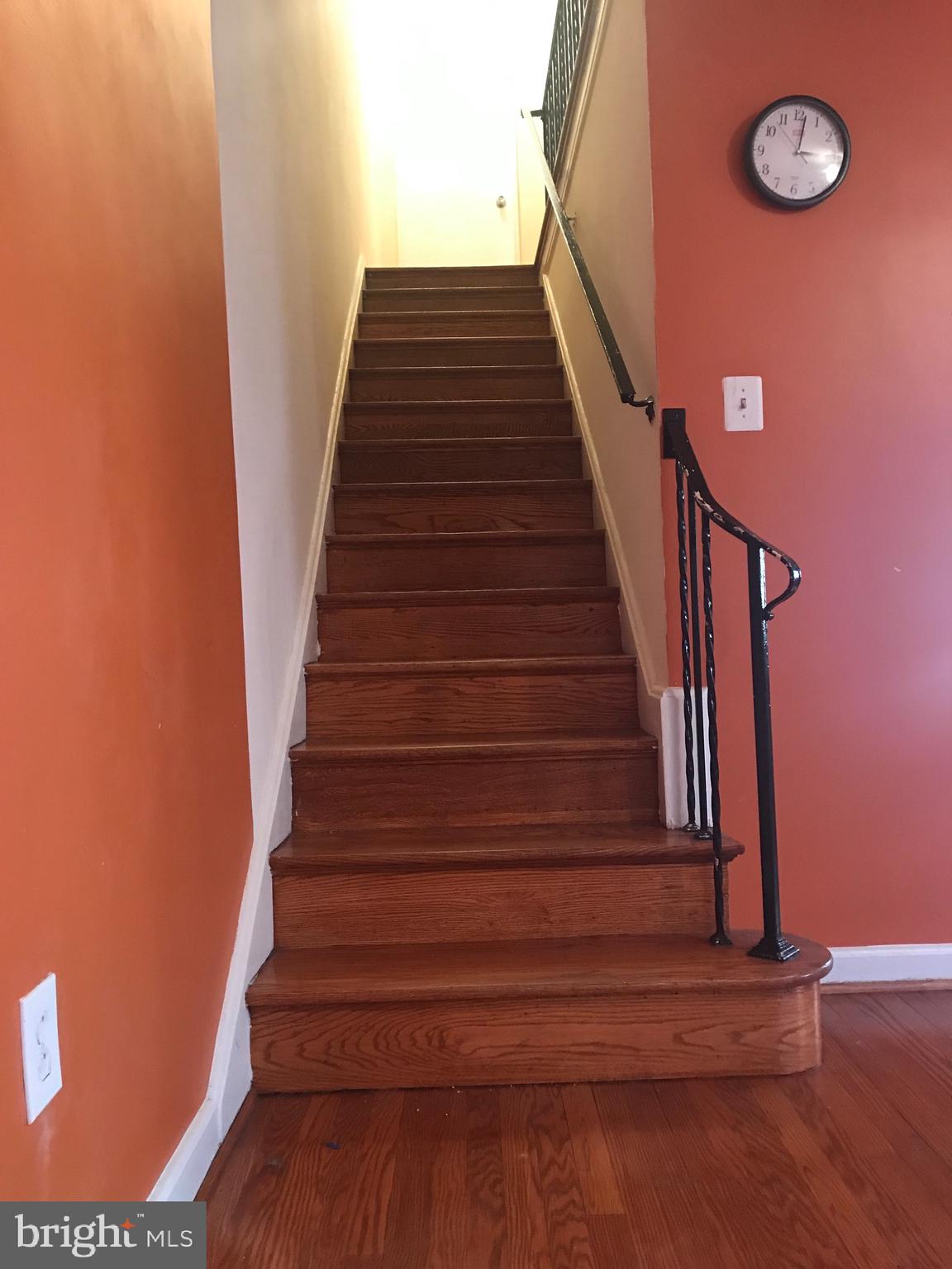1437 Rittenhouse Street Northwest Washington, DC 20011 - Photo 11 of 16 Hardwood stairs to second level