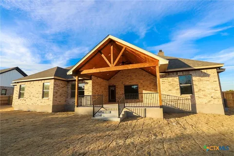 a view of a street view from a balcony