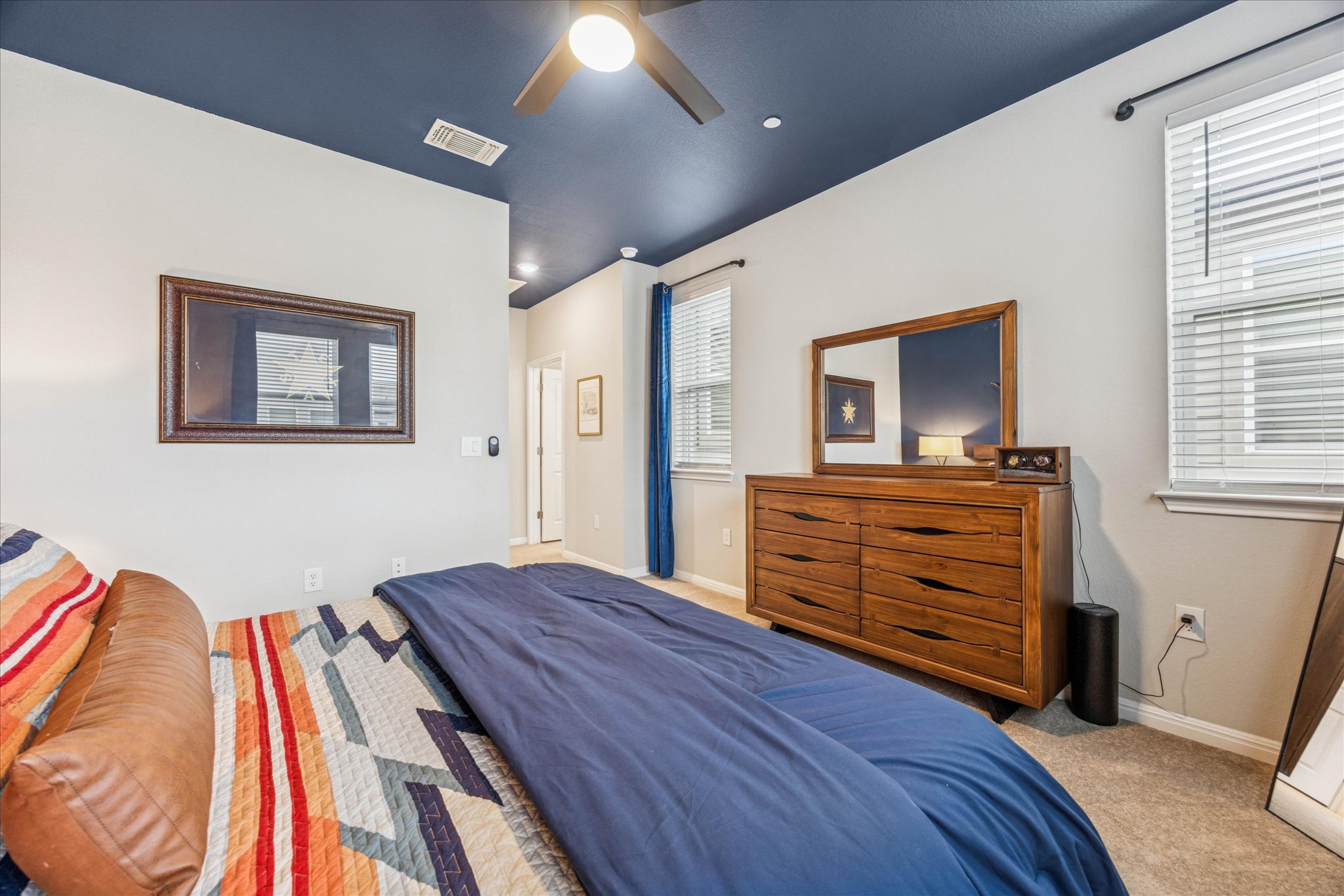 9015 Cattle Baron Path, Unit 1002 Austin, TX 78747 - Photo 12 of 20 a room with a bed and furniture