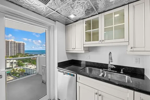 a view of a balcony with city