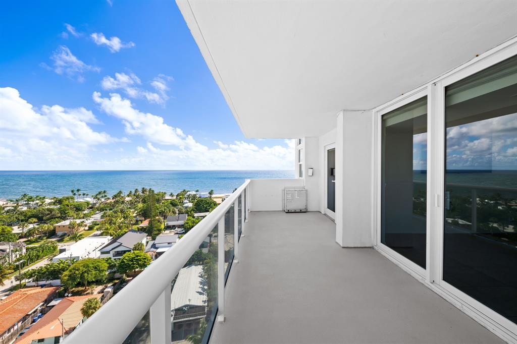 2841 North Ocean Boulevard, Unit 1710 Fort Lauderdale, FL 33308 - Photo 19 of 34 a view of a balcony with an ocean view