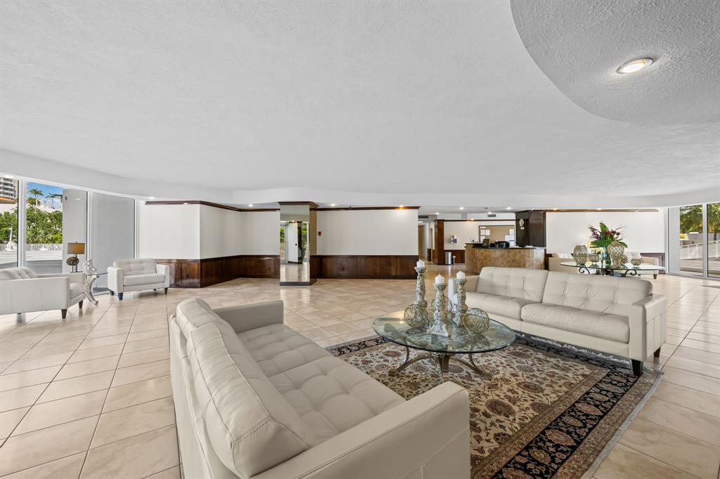 2841 North Ocean Boulevard, Unit 1710 Fort Lauderdale, FL 33308 - Photo 28 of 34 a living room with furniture