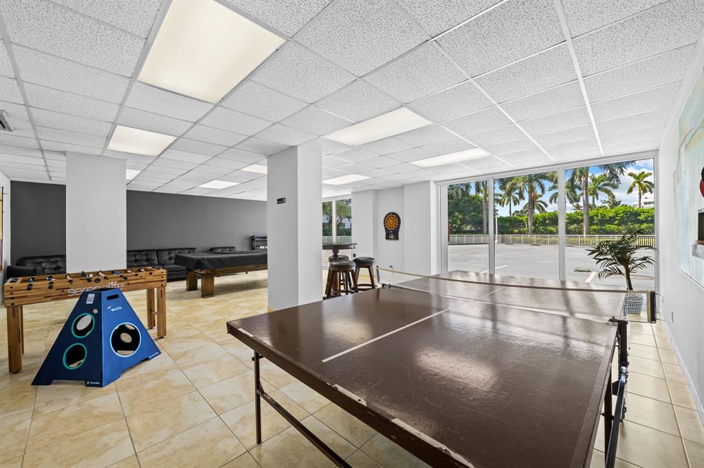 2841 North Ocean Boulevard, Unit 1710 Fort Lauderdale, FL 33308 - Photo 31 of 34 a gym hall with a large window