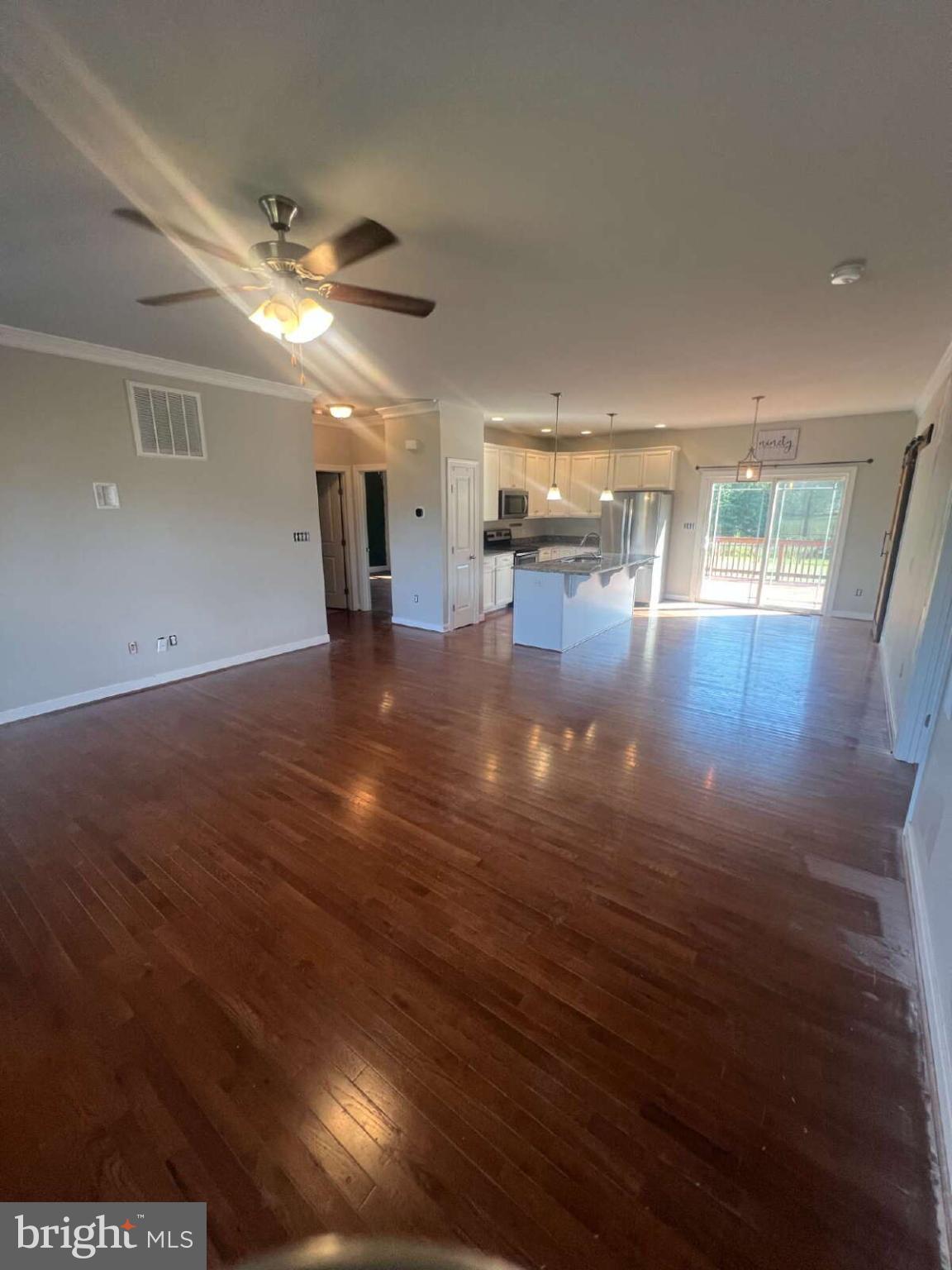 90 Hickory Ridge Circle Mineral, VA 23117 - Photo 9 of 21 an empty room with wooden floor and windows
