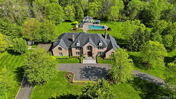 an aerial view of a house with a garden